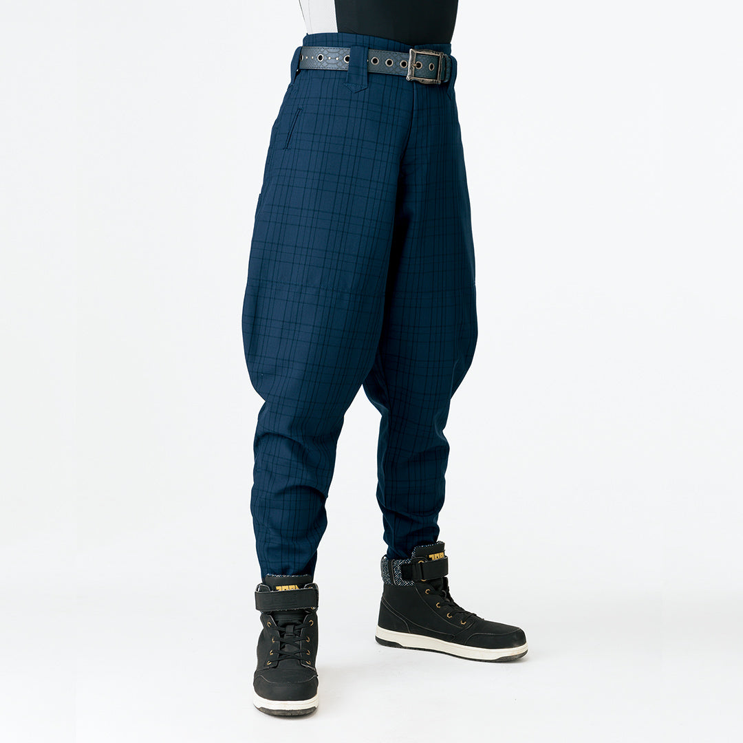 Toraichi checked horse riding tobi pants in dark navy styled with work boots