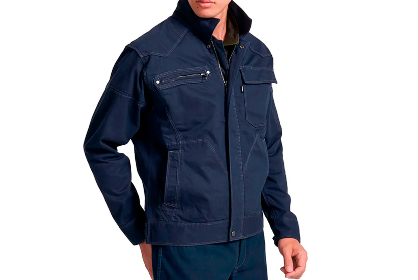 A model wearing a navy blue work jacket with a stand collar, zippered chest pocket, and flap pocket, shown against a light gray background.