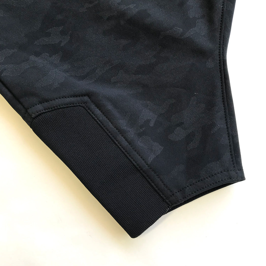 Leg cuff detail of black Toraichi tobi pants with reinforced stitching