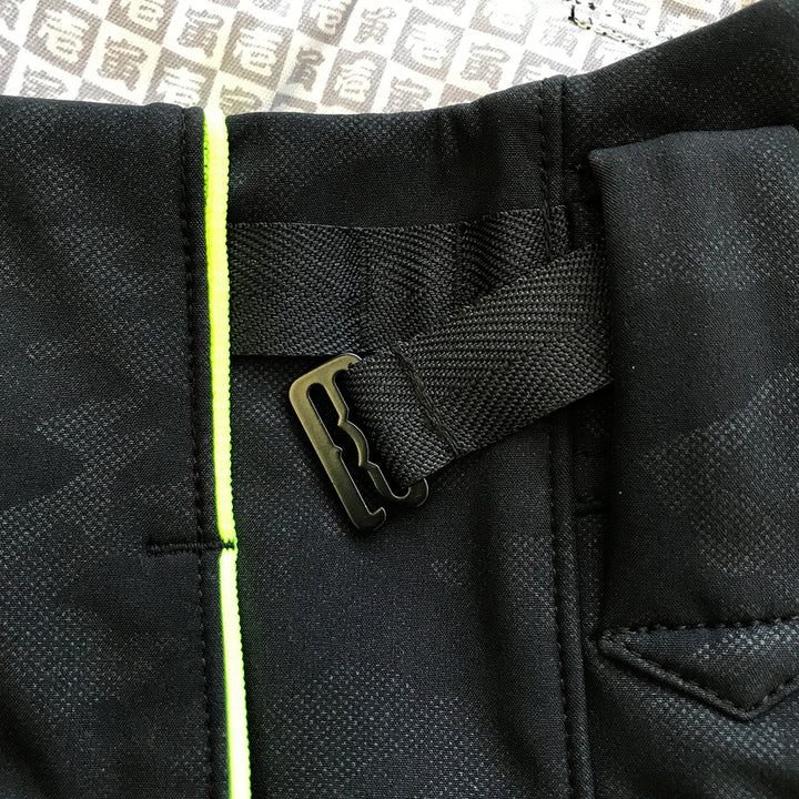 Side view showing belt loop and fluorescent yellow stitch on Toraichi tobi pants