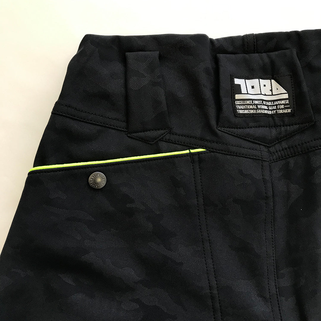 Waistband detail of black Toraichi tobi pants with adjustable buckle