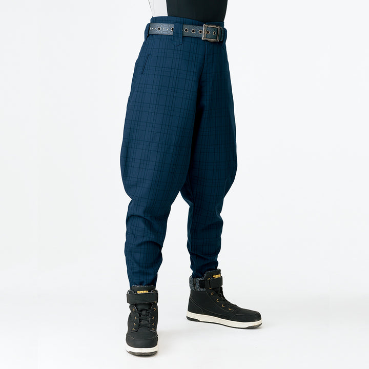 Toraichi checked horse riding tobi pants in dark navy styled with work boots