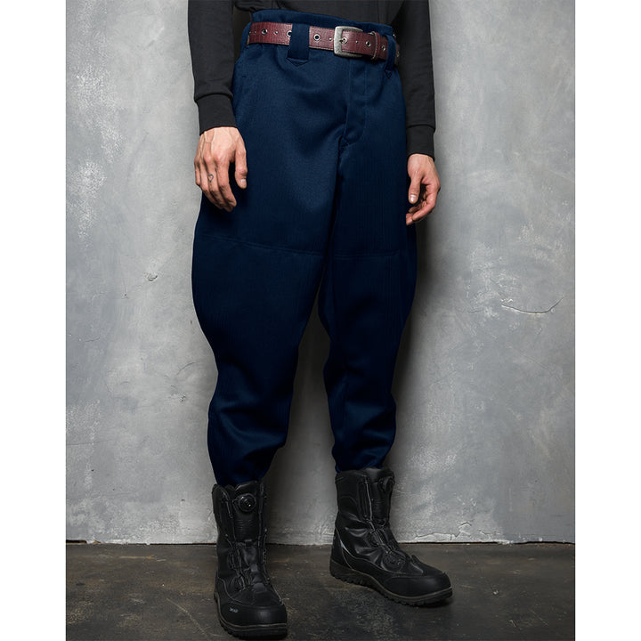 Toraichi navy horse riding pants front view with boots against concrete wall