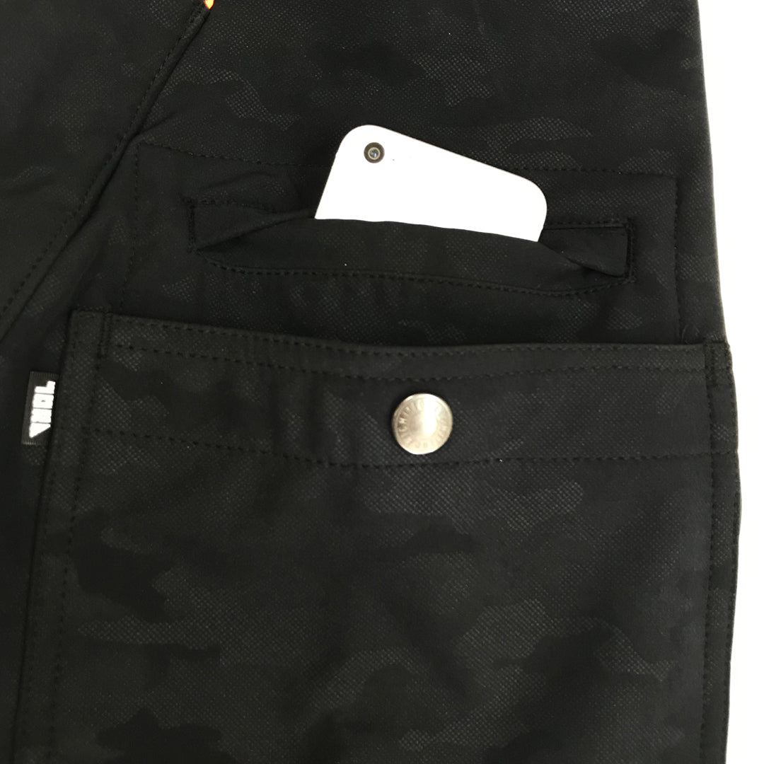 Close-up of the reflective safety tape and orange zipper trim on the Toraichi 9520-751 cargo pants.