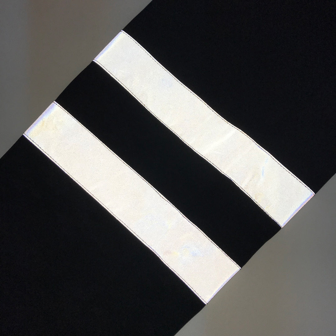 Rear view of the Toraichi Japanese workwear trousers emphasizing reinforced seams and back pocket design.