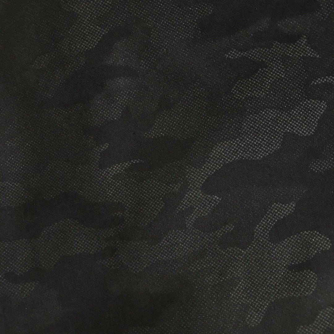 Close-up of the waistband and button closure of the Toraichi Japanese workwear cargo pants demonstrating strong tailoring.