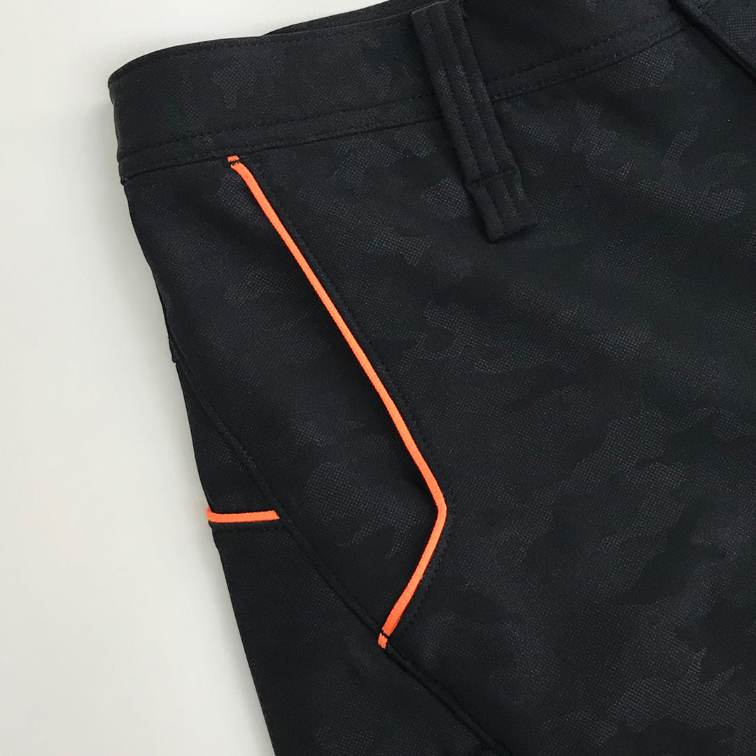 Detailed shot of the Toraichi Japanese workwear pocket area showcasing precision stitching and rugged material.