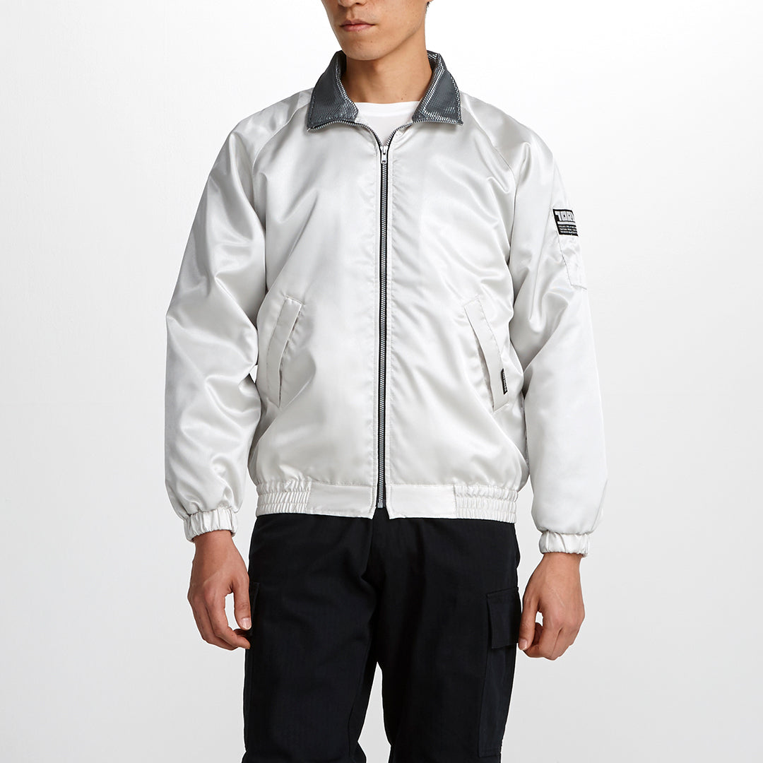 Front view of model wearing the white Toraichi 3980-124 light jacket made from Tetofine microfiber polyester