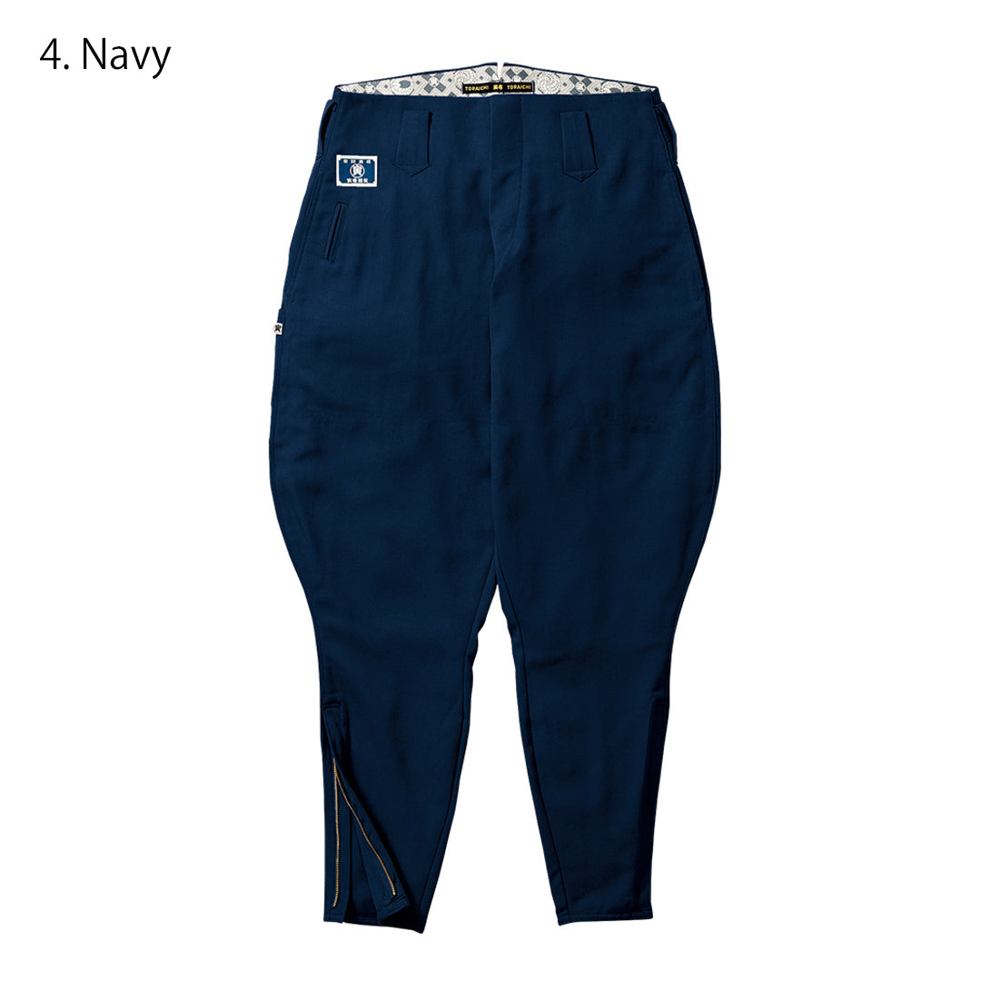Full back silhouette of navy Toraichi horse riding pants paired with boots