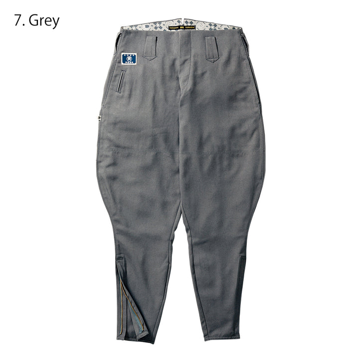 Close-up of button and waistband stitching on Toraichi tobi pants