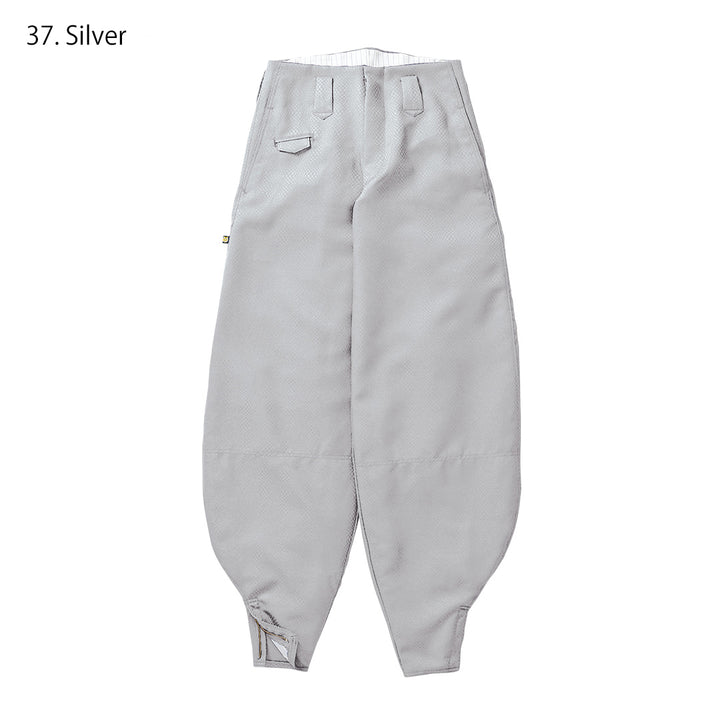 Side profile of navy hachibu pants with structured cut