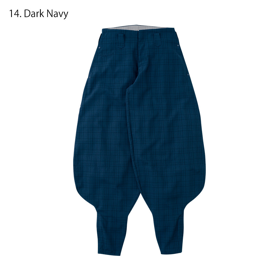 High-waist white check tobi pants styled with boots