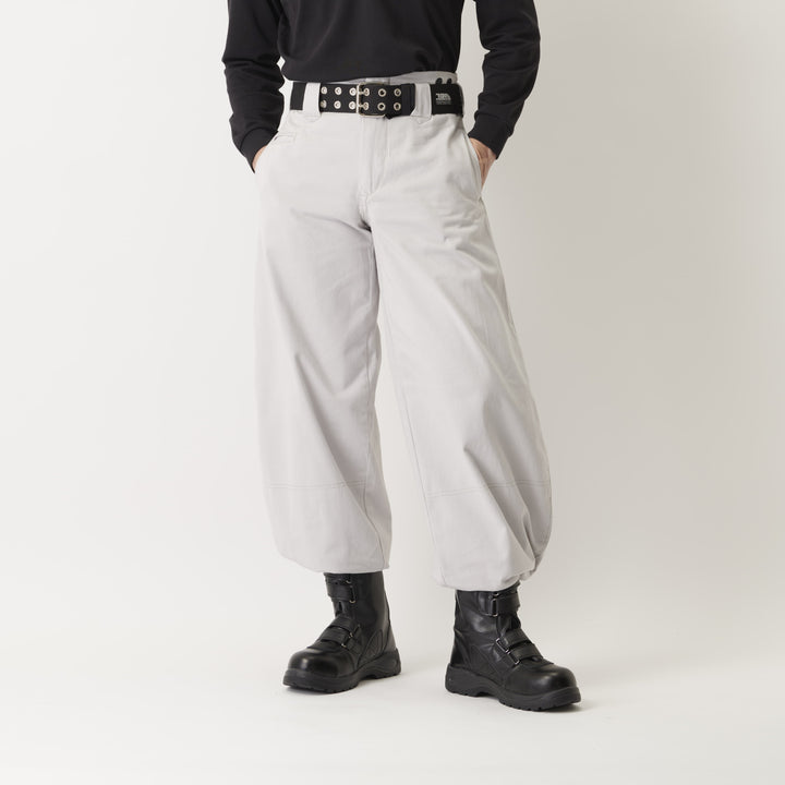 Slim super super long hachibu tobi pants in light grey styled with black boots