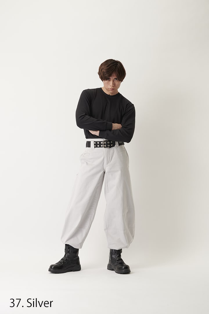 Japanese tobi workwear pants in slim silhouette paired with combat boots