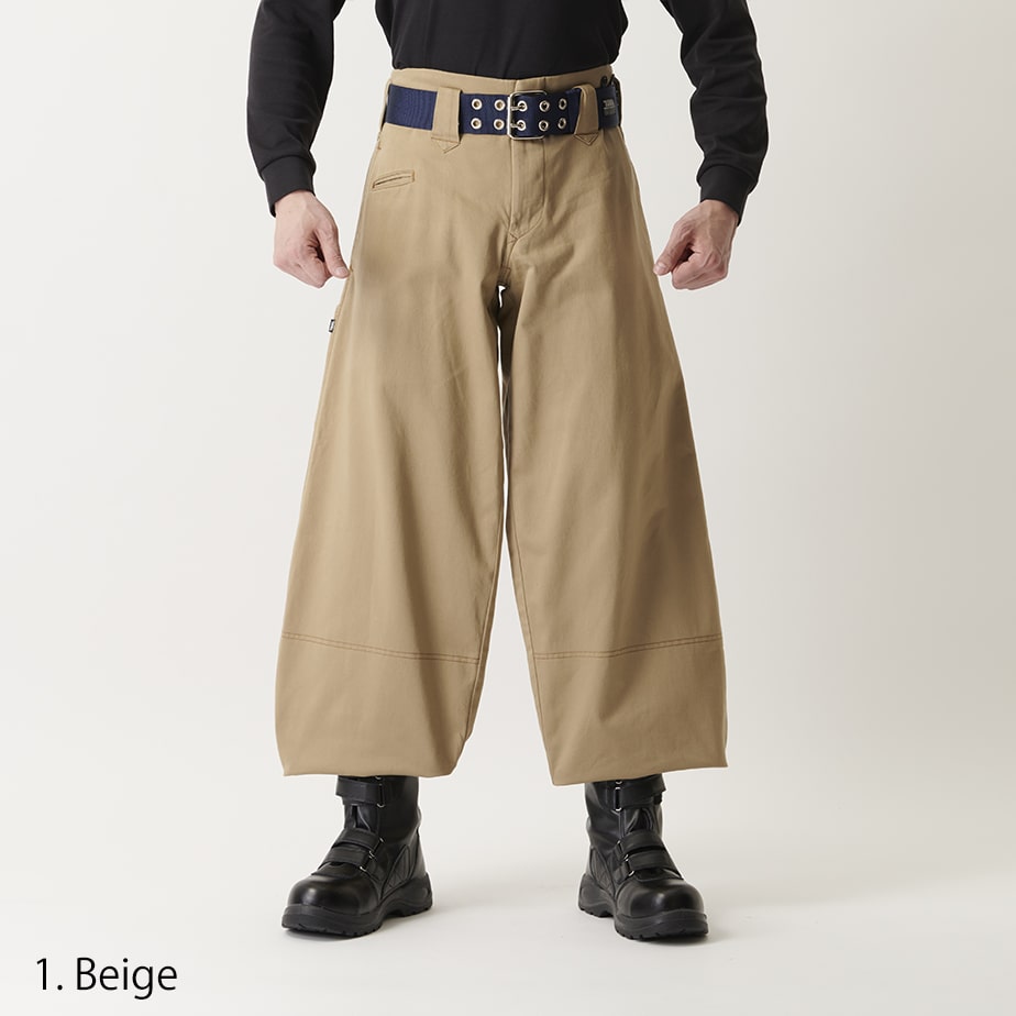 Light grey slim hachibu pants styled with grommet belt and combat boots