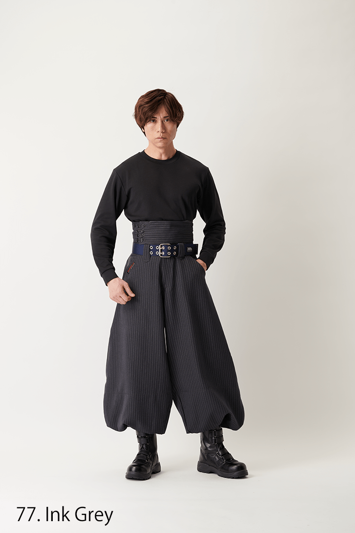 Streetwear style outfit with navy tobi pants and black combat boots