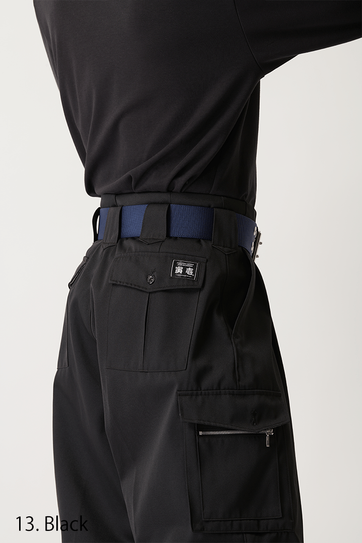 Black K-1 work trousers styled with heavy-duty boots and wide belt