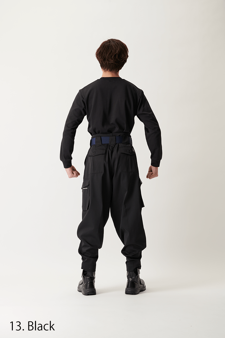 Functional black utility pants with cargo pockets and wide tapered cut