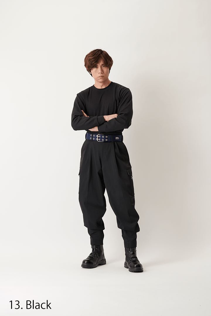 Black Japanese work pants with tapered legs and reinforced pocket design