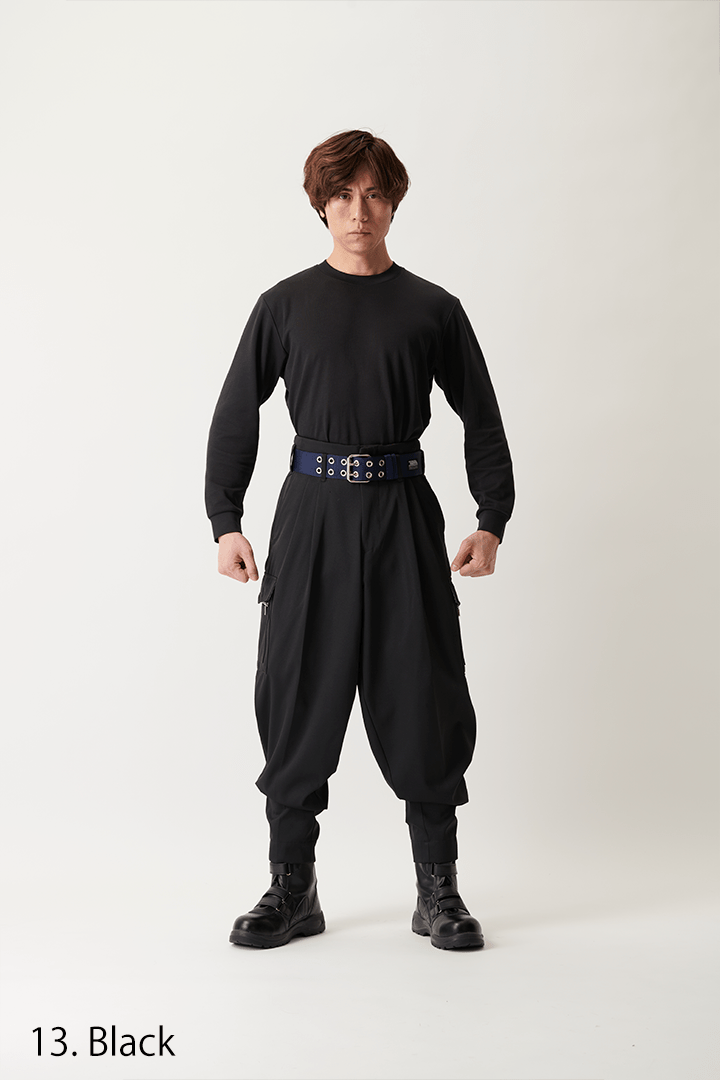 Model in black K-1 pants combining Japanese workwear and modern street style