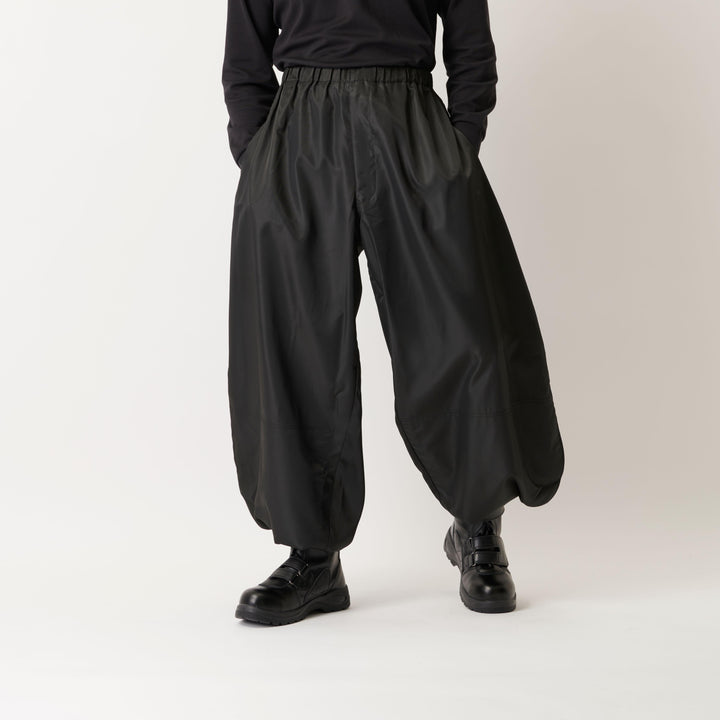 Black Toraichi T-8 Yakke pants front view with wide-leg silhouette