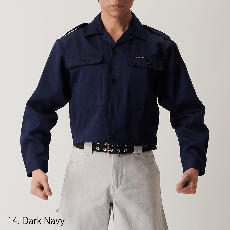 Close-up of collar and button details on black short open shirt