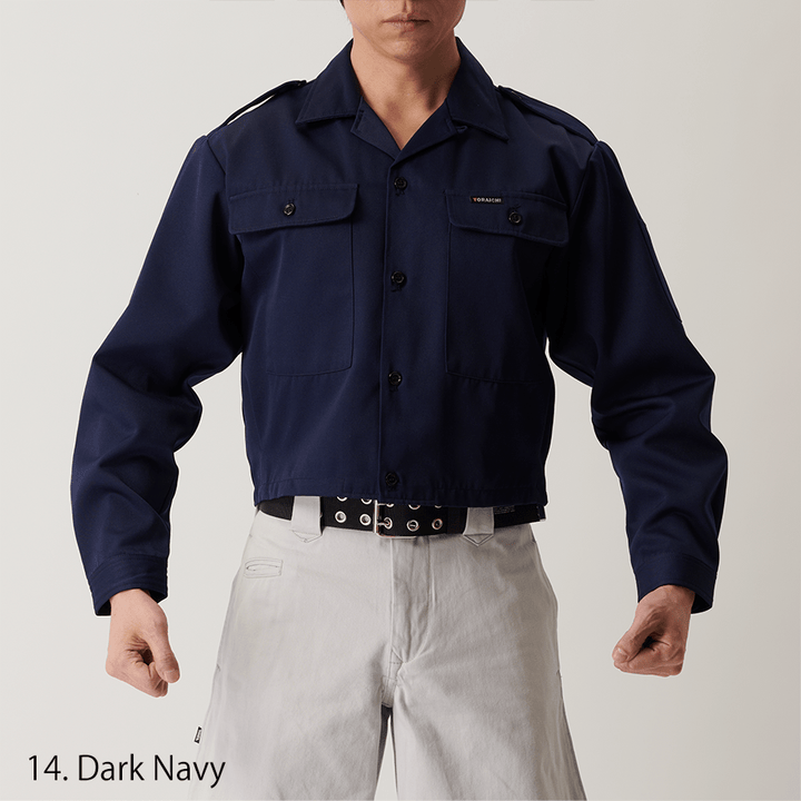 Close-up of collar and button details on black short open shirt