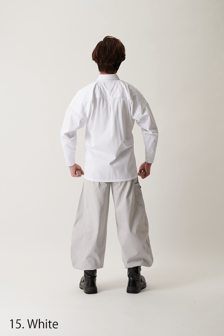 White tobi shirt cuff detail highlighting fabric texture