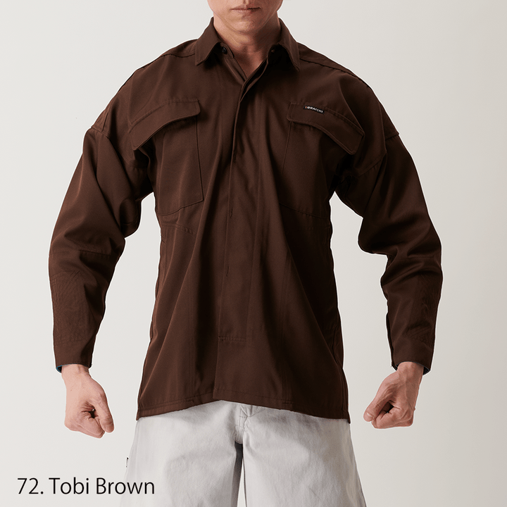 White work shirt tucked into pants, semi-formal pose