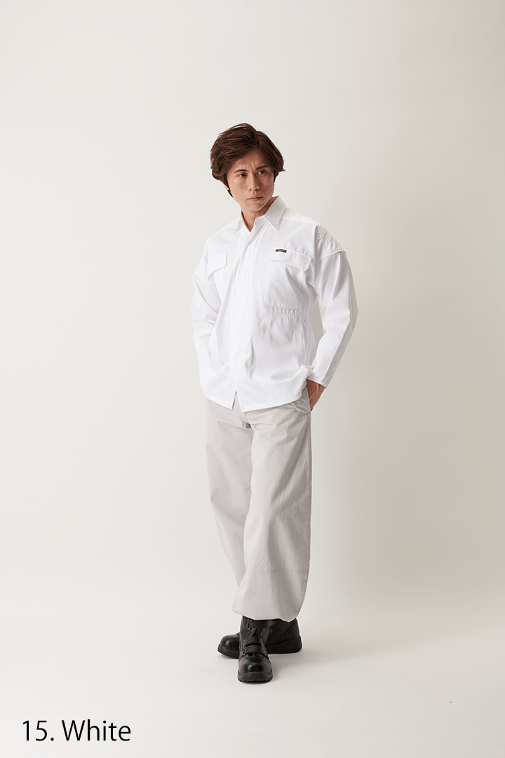 Model walking outdoors wearing white Japanese workwear shirt