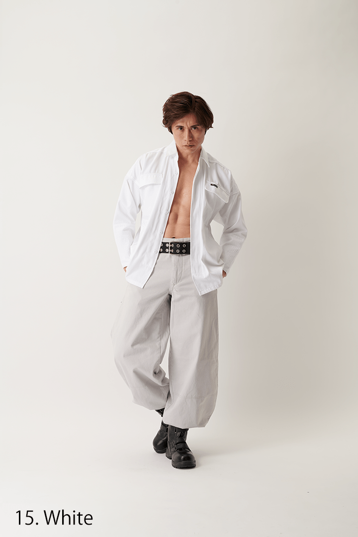 White tobi shirt paired with light trousers, front-facing model pose