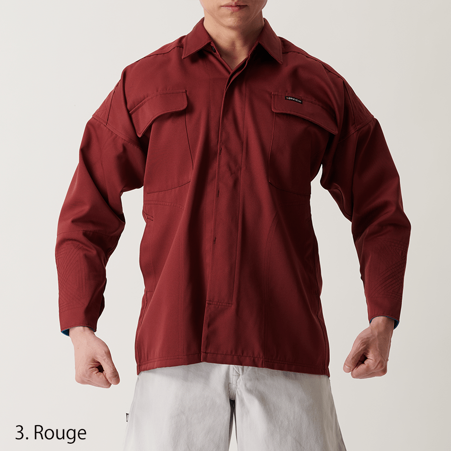 White shirt folded neatly against plain background