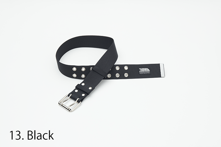 beige toraichi 2-pin belt with silver buckle and metal eyelets on white background
