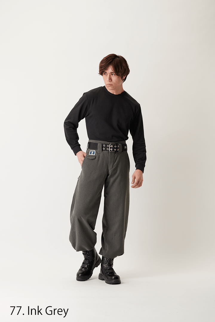 Toraichi tobi pants wide silhouette standing pose grey