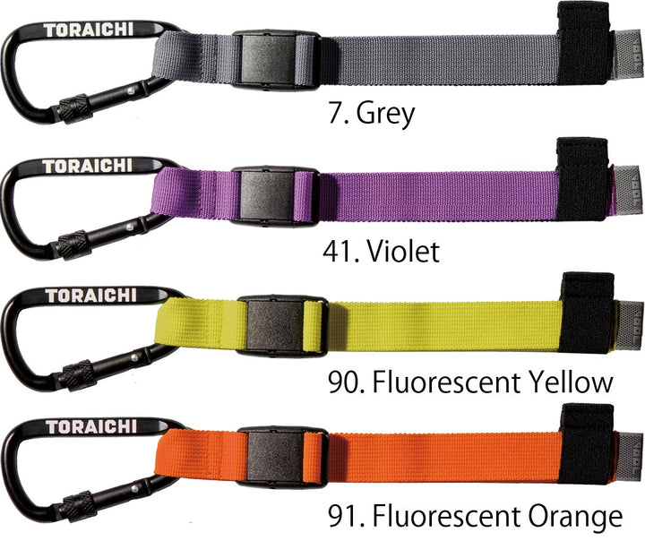 Close-up of Toraichi branded carabiner attached to nylon strap