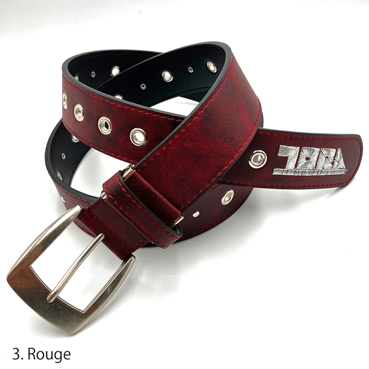 burgundy toraichi patterned belt with metal buckle and grommets