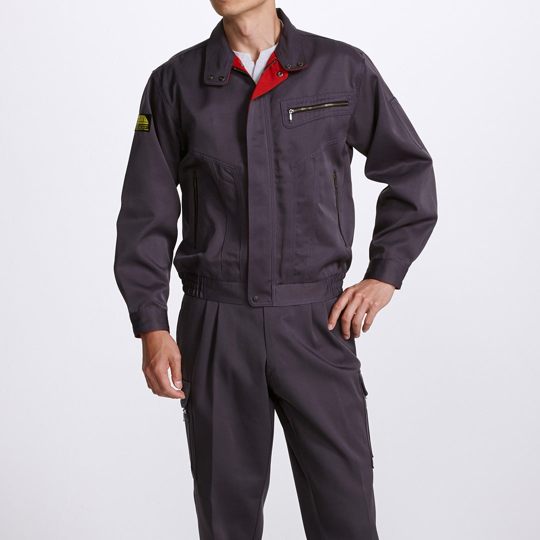 Front view of model wearing Toraichi 2530-147 Tobi Jacket, a Japanese workwear blouson in charcoal grey