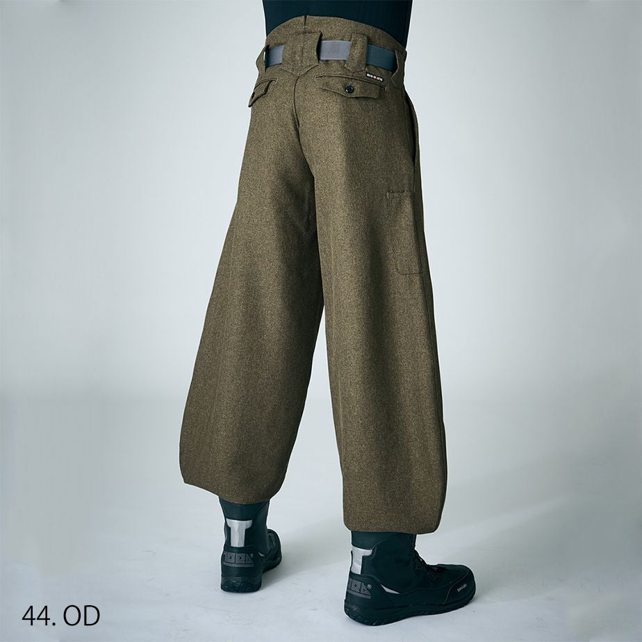 Japanese workwear tobi pants slim cut side profile with boots