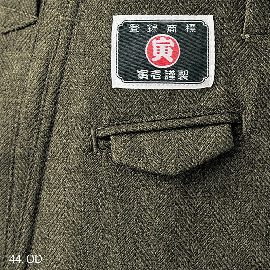 Pocket stitching detail of Japanese tobi pants in olive brown fabric