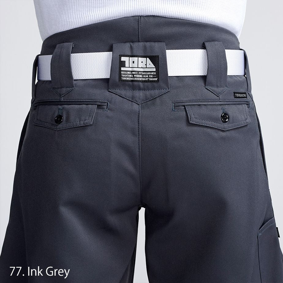Rear view of Toraichi tobi pants showcasing waistband and pocket construction