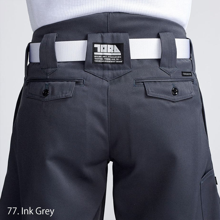 Rear view of Toraichi tobi pants showcasing waistband and pocket construction