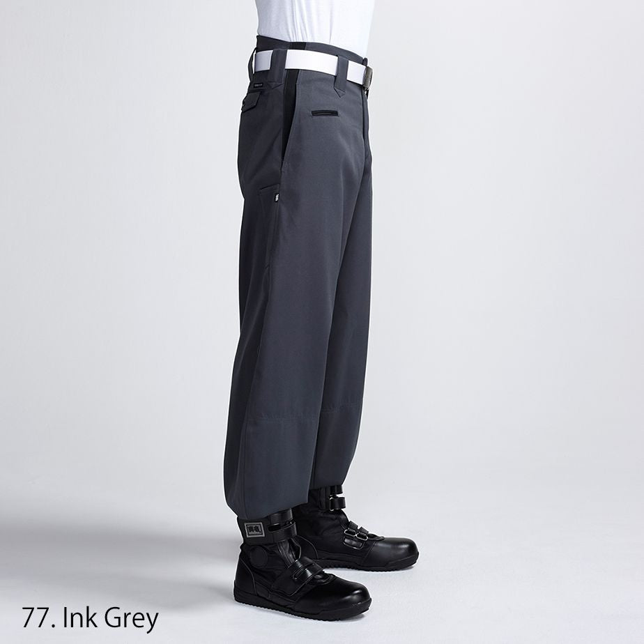 Detailed view of Toraichi tobi pants belt loops and back seam tailoring