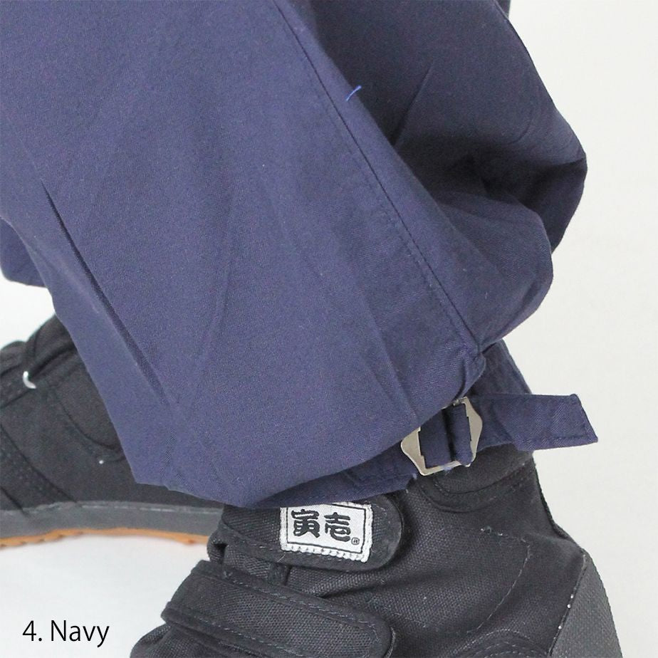 Front view of Toraichi beige tobi pants with pleated construction