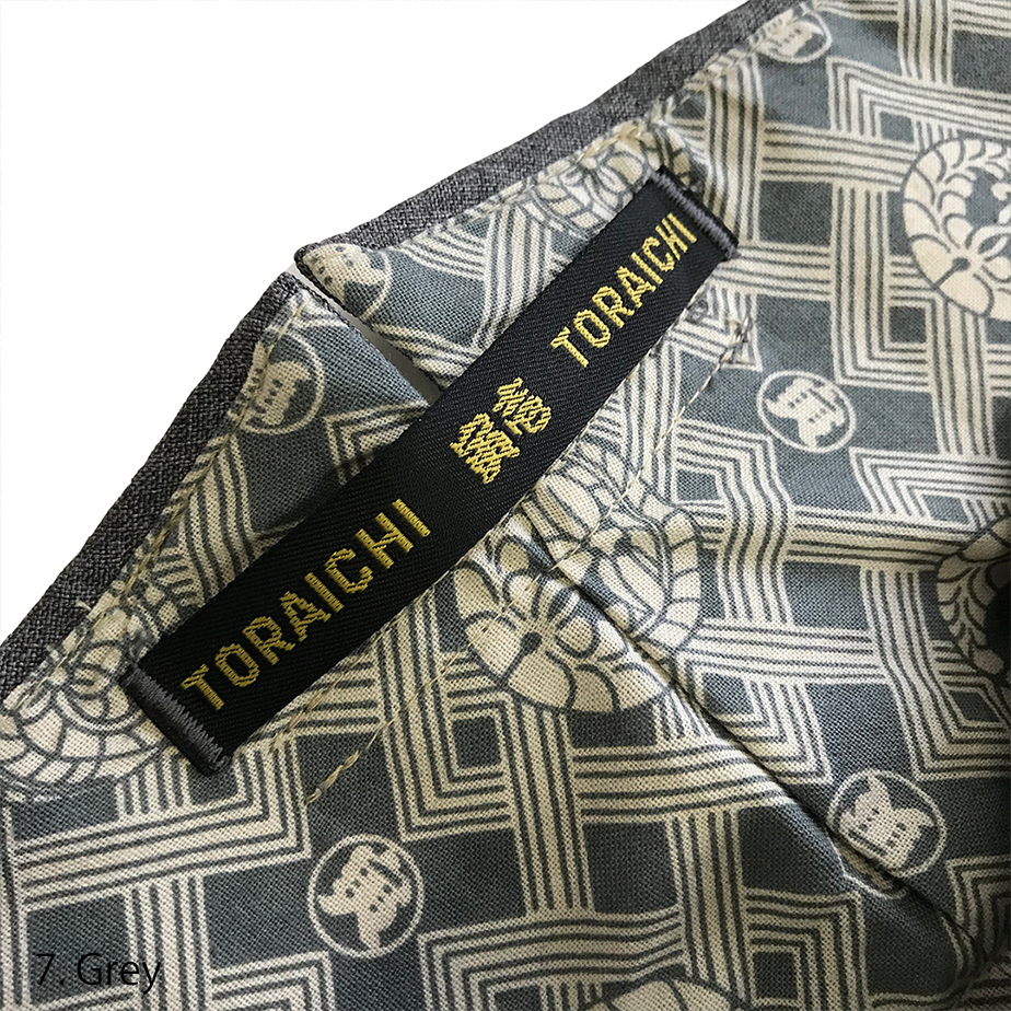 Close-up of Toraichi riding pants fabric texture in grey