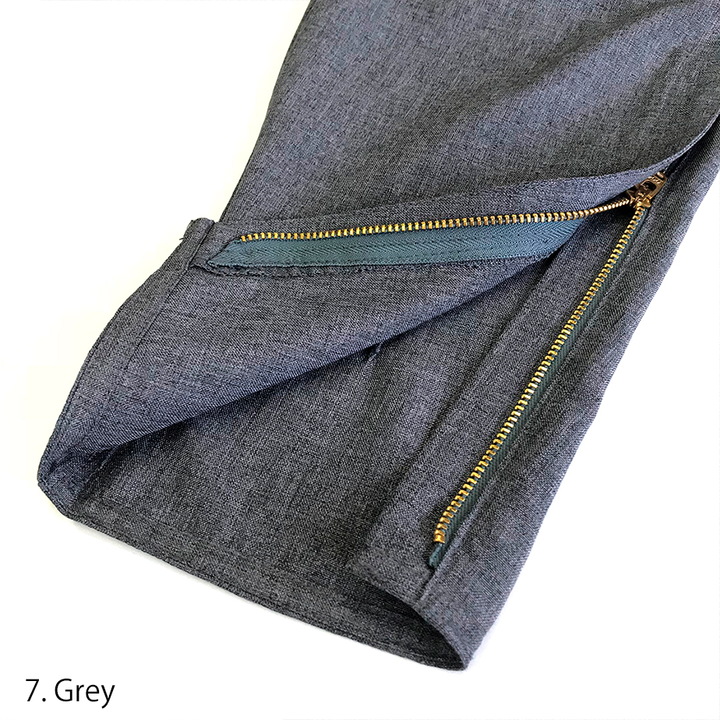 Rear pocket view of Toraichi grey riding pants with reinforced stitching