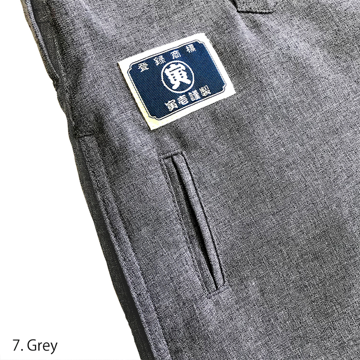 Toraichi logo patch stitched inside grey riding pants waistband