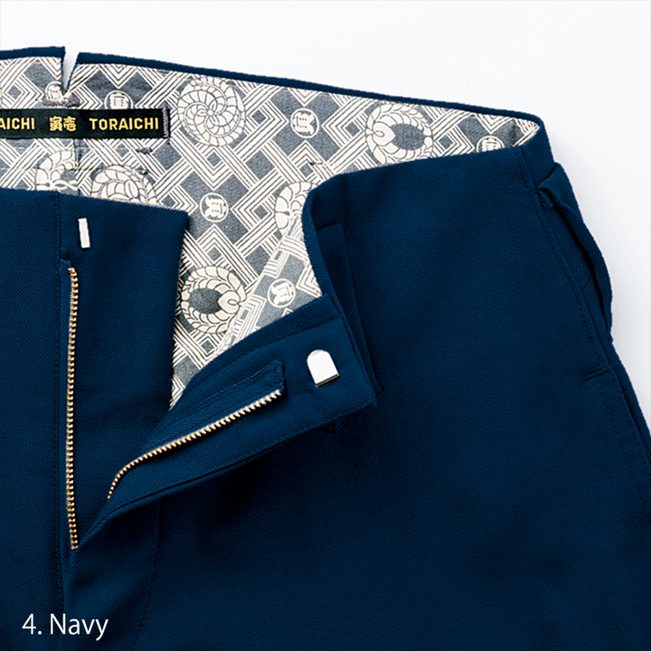 Zipper cuff detail on navy Toraichi horse riding pants