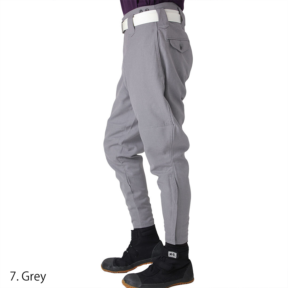 Dynamic cut grey tobi pants styled with a white belt