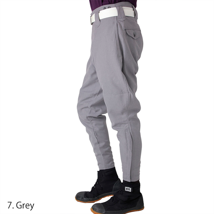 Dynamic cut grey tobi pants styled with a white belt