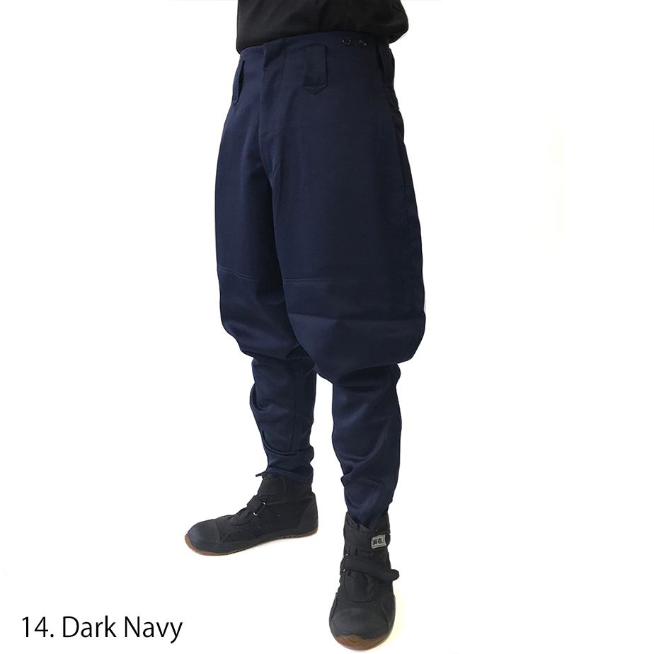Full body view of Toraichi navy horse riding pants styled with boots